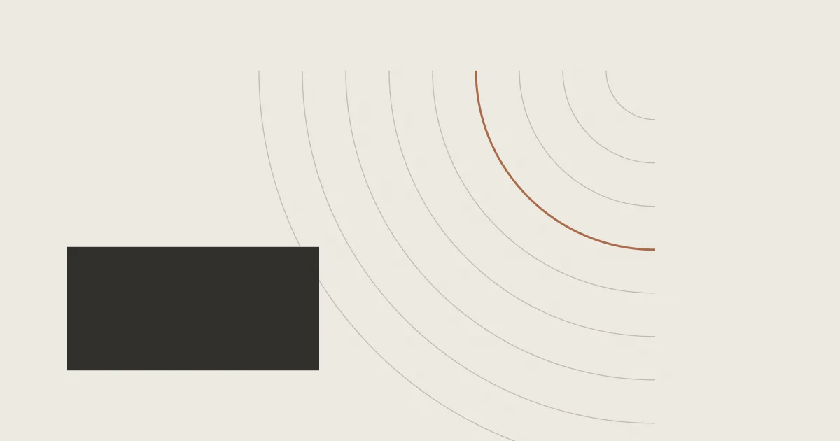 Abstract composition of quarter arcs radiating from a corner above a solid rectangular block